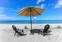 Beach chairs and umbrella